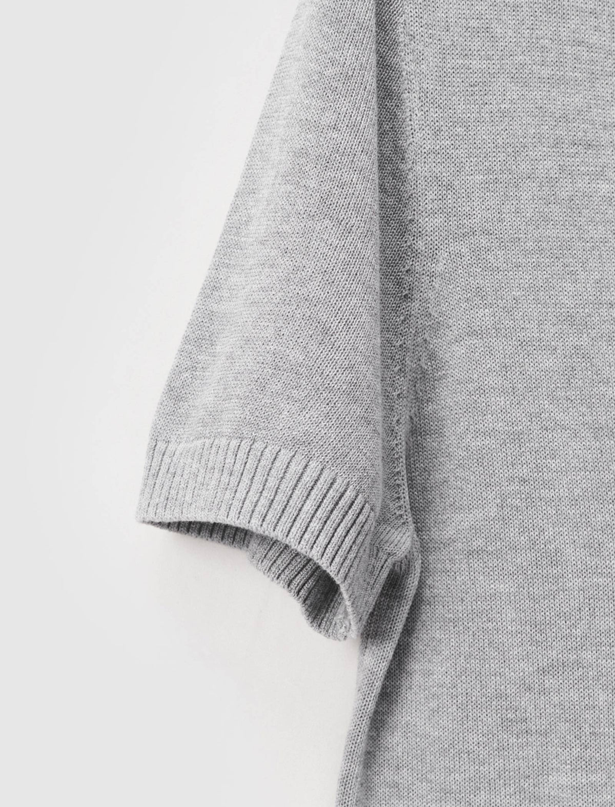 Notched V-Neck Graphic Knit Short Sleeve Top