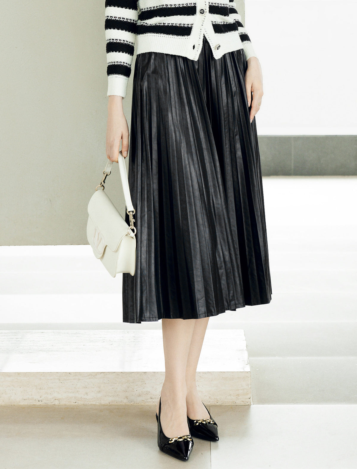 Pleated Faux Leather Midi Skirt