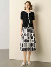 The Monochromatic Geometric Midi Skirt