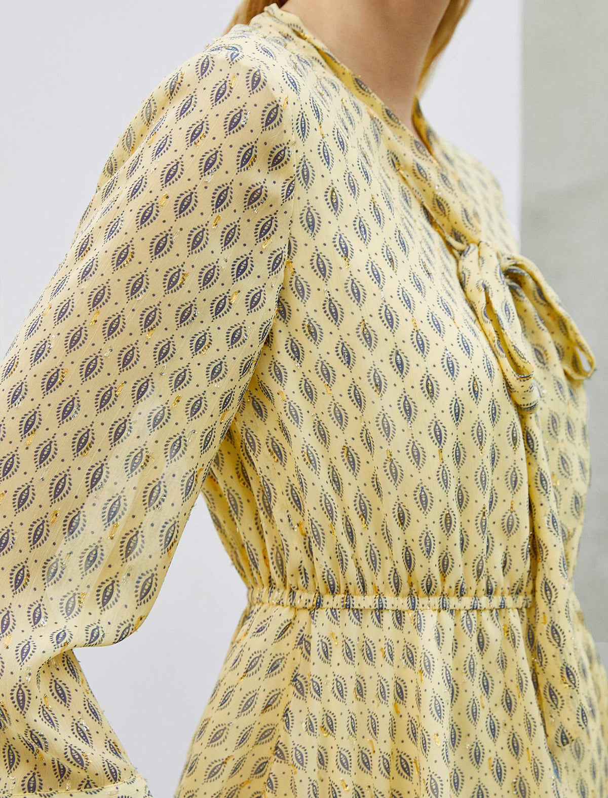 Leaf Print Peplum Tie Neck Blouse