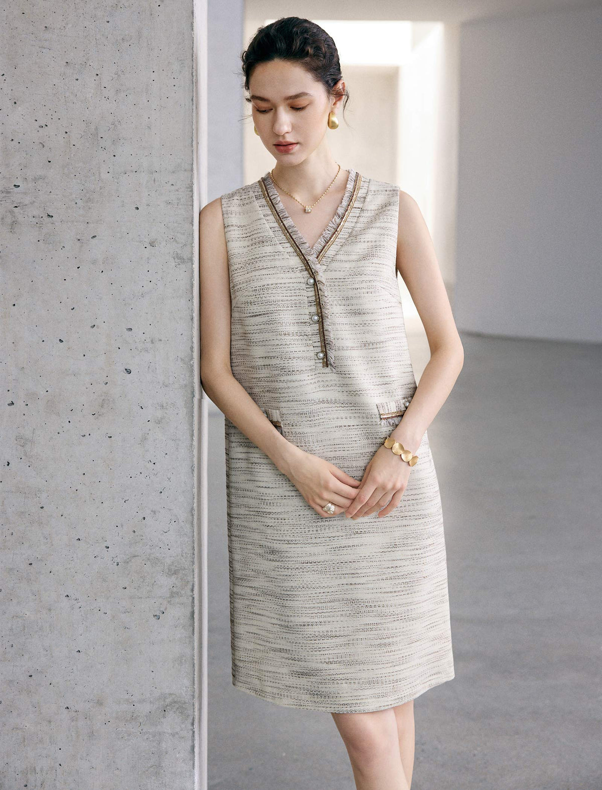 Beige textured sleeveless button front midi dress
