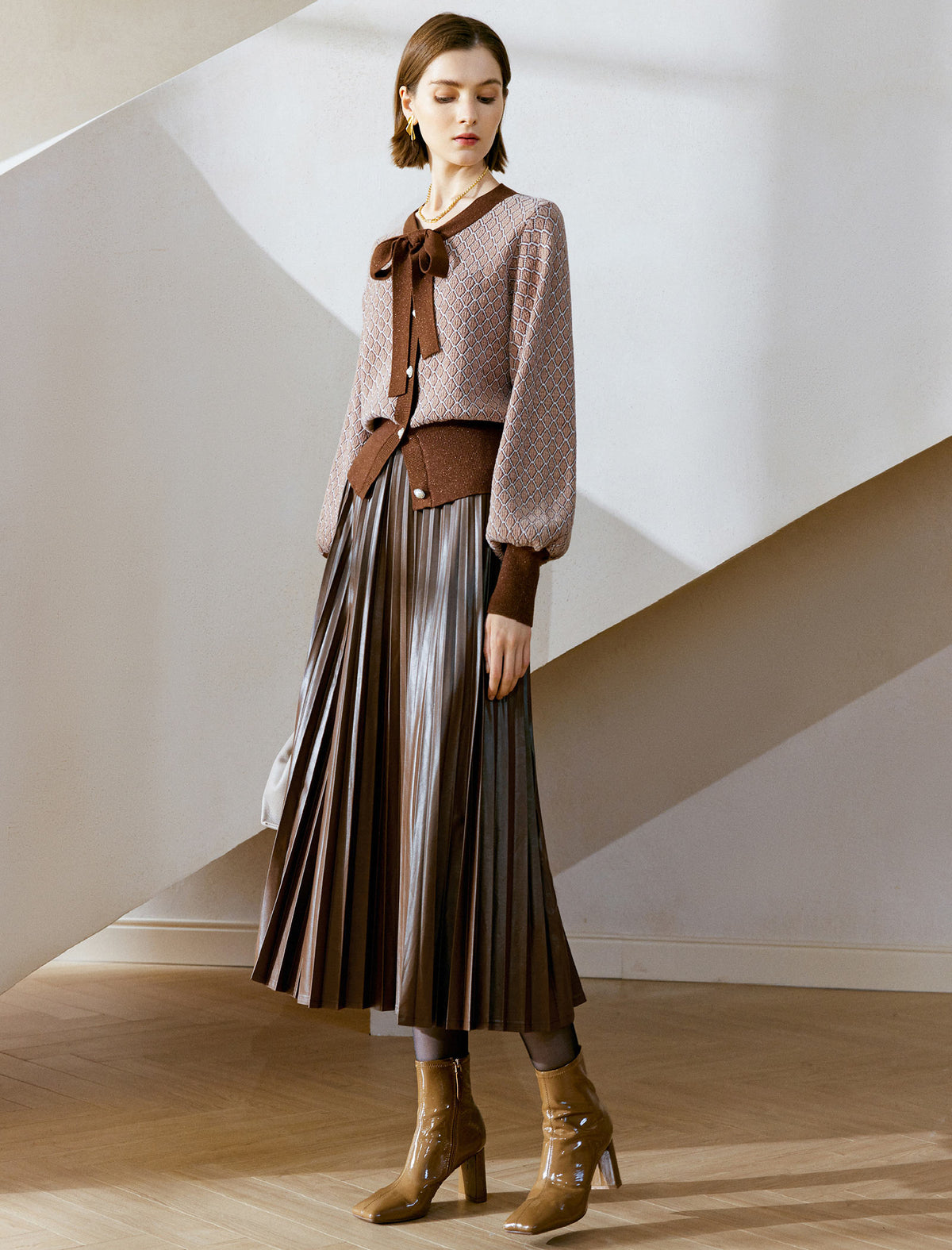 Pleated Faux Leather Midi Skirt