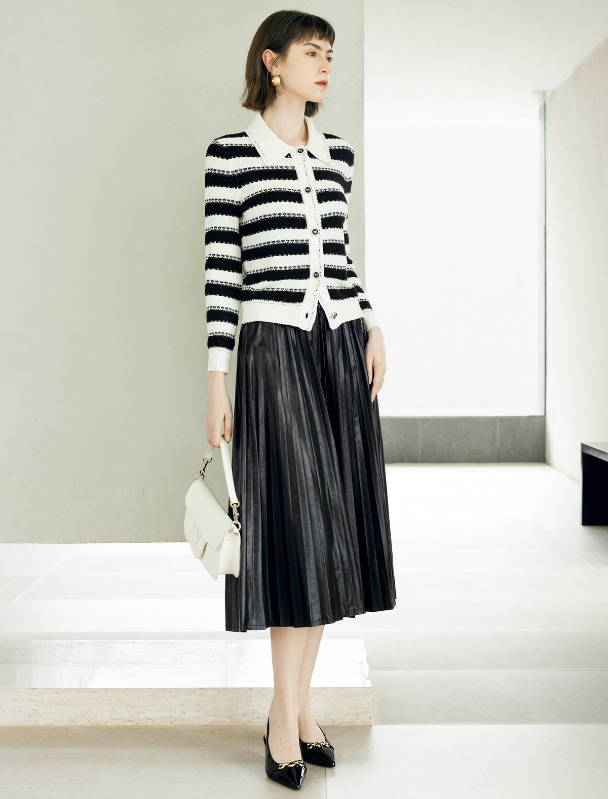Pleated Faux Leather Midi Skirt