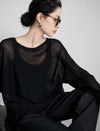 Loose-fitting long-sleeve knit top